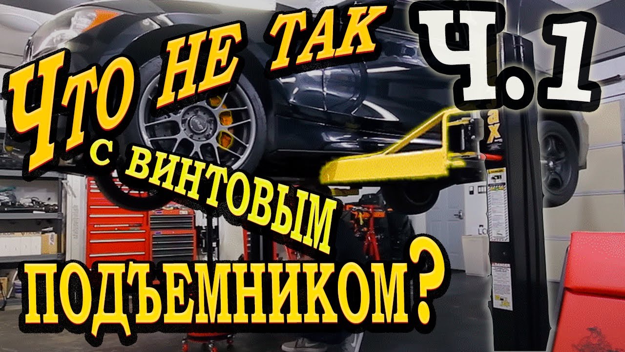 механик осматривает подвеску автомобиля на подъемнике механик осматривает подвеску автомобиля на подъемнике